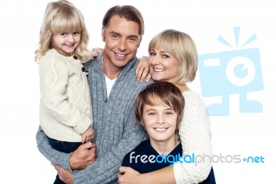 A Happy Family With Children In Studio Stock Photo