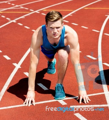 A Male Athlete Ready To Run The Race Stock Photo