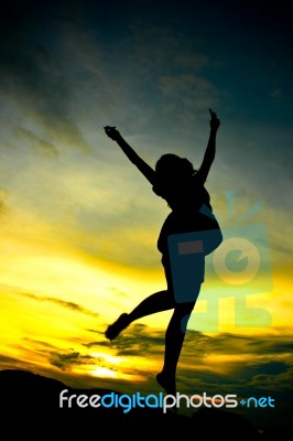 A Woman Jumping  Stock Photo