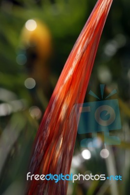 Abstract Orange Glass Art Piece Stock Photo
