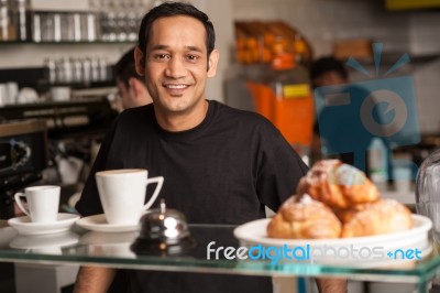 Active Staff In Restaurant Kitchen Stock Photo