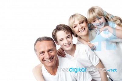 Affectionate Family With Children In Row Stock Photo