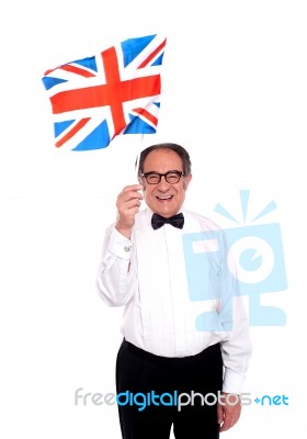Aged Man Holding UK Flag Stock Photo