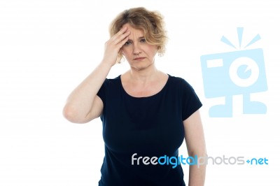 Aged Woman Having Headache Stock Photo