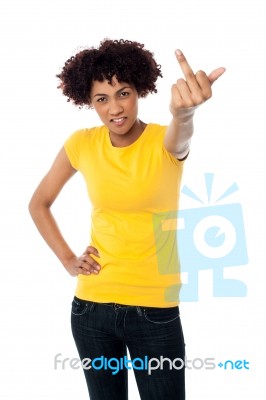 Angry Female Showing Middle Finger Stock Photo