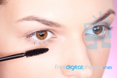 Applying Mascara On Eye Stock Photo