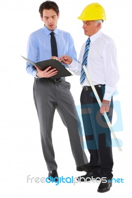 Architects In Discussion Stock Photo