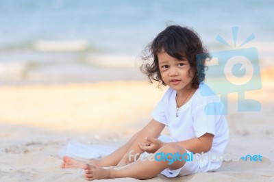 Asian Boy Play On Beach Stock Photo