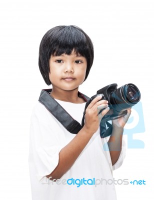 Asian Child With Digital Camera Stock Photo