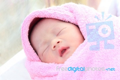 Asian New Born Infant Sleep In Towel Stock Photo