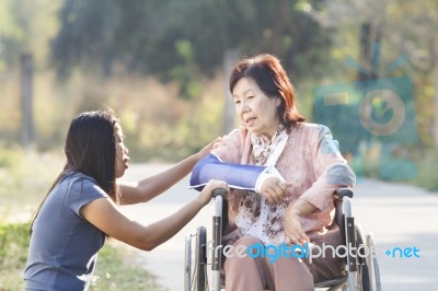 Asian Senior Woman Broken Wrist Stock Photo