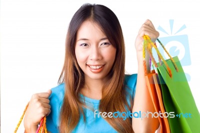 Asian Woman Holding Shopping Bag Stock Photo