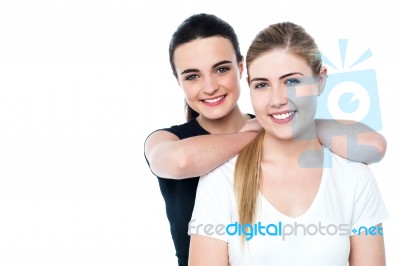 Attractive Smiling Teen Girls Facing Camera Stock Photo
