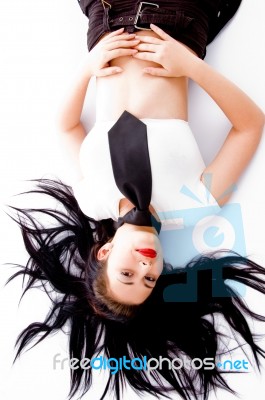 Attractive Young Female Lying Down Stock Photo