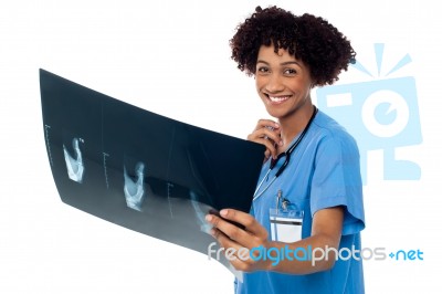 Attractive Young Medical Professional Holding X-ray Sheet Stock Photo