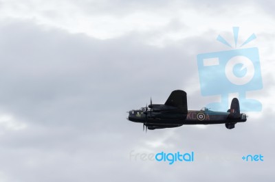 Avro Lancaster Bomber Flying Over Shoreham Airfield Stock Photo