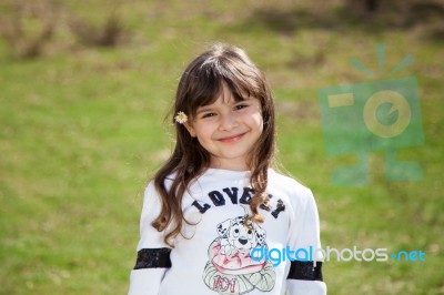 Baby Flower In Her Hair Stock Photo