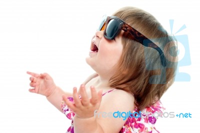 Baby Girl Wearing Sunglasses Stock Photo