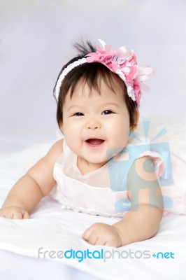 Baby Is Smiling And Happy Stock Photo