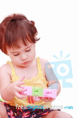 Baby Playing With Toys Stock Photo
