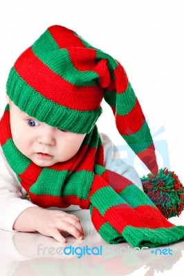 Baby With Christmas Hat And Scarf Stock Photo