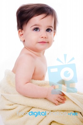 Baby Wrapped In Bath Towel Stock Photo