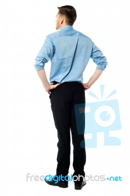 Back Pose Of A Casual Businessman Stock Photo