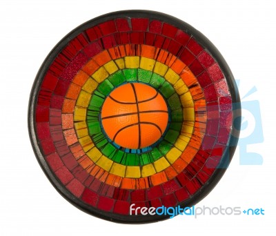 Basketball In Colorful Ceramic Glass Plate Isolated On White Bac… Stock Photo