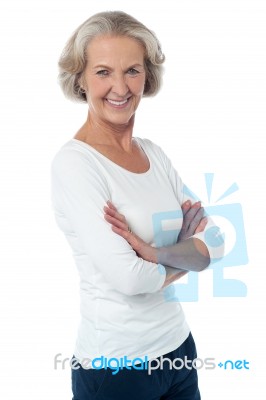 Beautiful Aged Woman With Crossed Arms Stock Photo