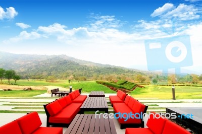 Beautiful Outdoor Space With A Table And Chairs  Stock Photo