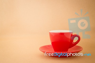Beautiful Red Cup Of Coffee On Vintage Background Stock Photo