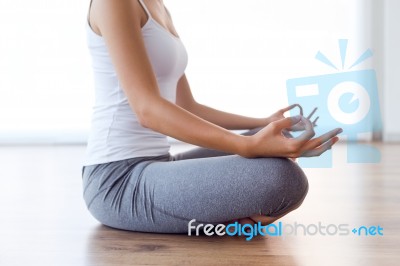 Beautiful Young Woman Doing Yoga Exercises At Home Stock Photo