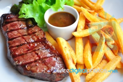 Beef Steak And Chips Stock Photo