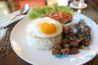 Beef With Fried Egg On Rice Stock Photo