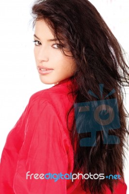 Black Hair Woman In A Red Shirt Stock Photo