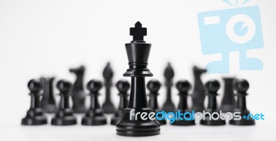 Black King Chess With Others Isolate For Business Concept - Stra… Stock Photo