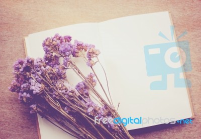 Blank Notebook And Dried Statice Flowers With Retro Filter Effec… Stock Photo
