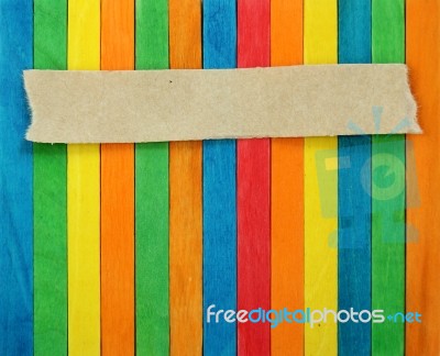 Blank Paper On Color Wood Background Stock Photo
