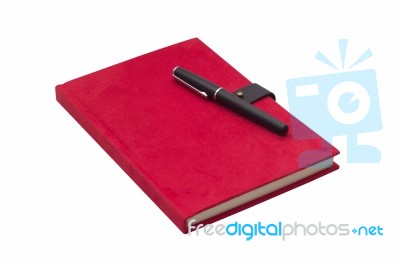 Blank Red Hardcover Notebook With Pen Isolated Stock Photo
