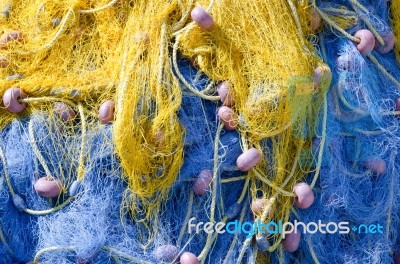 Blue And Yellow Fishing Nets Stock Photo