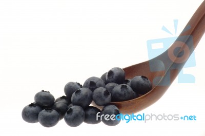 Blueberries On Wooden Spoon Stock Photo