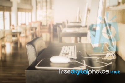 Blurred Living Room With Computer Appliance Stock Photo