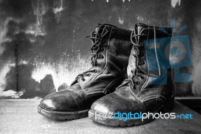 Boots Shoe On Wooden Stock Photo