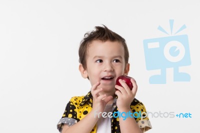 Boy And Apple Stock Photo