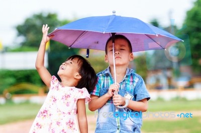 boy and little girl in the park stock photo royalty free image id
