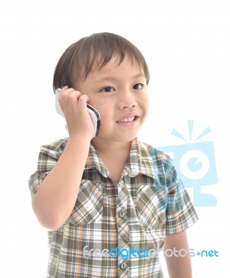 Boy Using Telephone Stock Photo