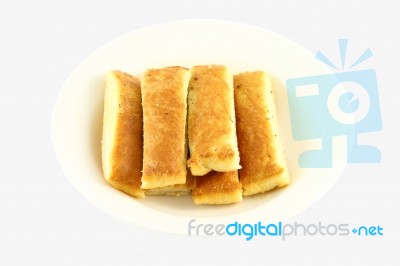 Bread Stick In White Disk On Light Gray Background Stock Photo