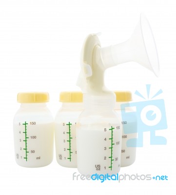 Breast Pump And Milk Bottle Stock On White Background Stock Photo