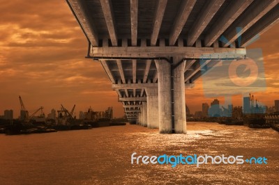 Bridge Over River With Dusky Sky Scene Stock Photo