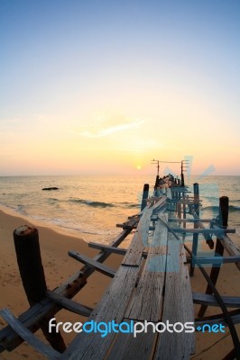 Bridge To Sea At Sunset Stock Photo